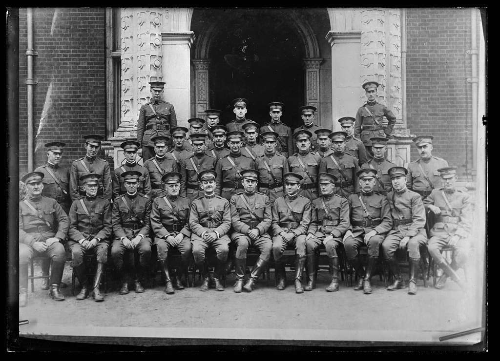 The Kentucky Unit. Medical Staff of the new American Red Cross hospital at Sarisbury, near Southampton. Grouped at the beautiful carved stone entrance to the main building of the hospital
