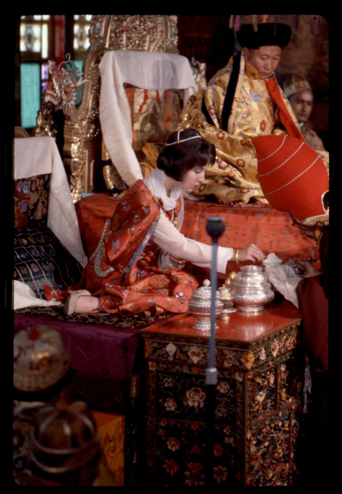Queen Hope on throne at coronation